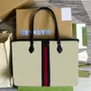 10A Canvas shoppingväskor 38 cm mode tygväskor kvinna handväska lyxig axelväska äkta läder damväska designer väskor med låda g215