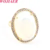 Wojiaer Natural Stone Ring Faceted 계란 모양 CZ 지르콘 모조 다이아몬드 반지 개방 조정 가능한 여성 보석 절묘한 선물 Bo928