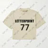 Designer infantil camiseta de camiseta meninos meninas de tamanho grande USA Tops Classic 77 Letter Prind Streetwear Crianças de manga curta vshirt de algodão casual de algodão