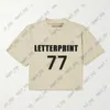 maglietta per bambini di design t-shirt per ragazzi ragazze oversize allentata usa tee tops classica 77 lettere stampa streetwear per bambini Abbigliamento maglietta casual in cotone con scollo a V manica corta