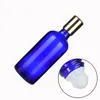 Vidrio de embalaje vacío Botella azul Aluminio Tapa de tornillo de oro brillante Frascos de aceite esencial Envase de embalaje cosmético recargable portátil 5ml 10ml 15ml 20ml 30ml 50ml 100ml