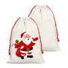 Sublimación personalizada Santa SATA 2022 Decoración de Navidad Bolsas de calcetín Bolsas de lienzo de caramelo Primeros regalos de Navidad para niños Fiesta de la fiesta