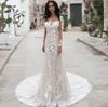 El más nuevo vestido de novia de sirena O cuello ilusión apliques de encaje completo vestidos de novia con lentejuelas