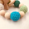 Baby Care Armband TROE TEETER CROCHET CHEW PEADS SÄKERHETS TEETHING Animal Wood Rattles Toy Teether Armband