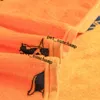 Coperte con lettere arancioni Coperta in velluto da viaggio per il tempo libero Inverno Autunno Caldo morbido Scialli per tappeti Asciugamani uomo donna di lusso