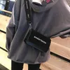 ネットレッドブラック女性の新しいファッション用途用途の多用途シンプルなポートスタイル小さな正方形のバッグブロードバンドシングルショルダーメッセンジャーシック