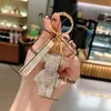 Plein strass diamant porte-clés fête faveur dessin animé ours cristal porte-clés mignon porte-clés porte-anneau bracelet en cuir sac charme pendentif Tiktok