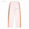 Pantalons de survêtement classiques arc-en-ciel sur le côté Pantalons décontractés Designer Loose Men Sports Pantalons décontractés Jogger Side Stripes Solid Joggers Pantalons de survêtement Pantalon arc-en-ciel Taille élastique