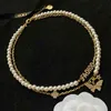 Outlet 2022 Nuevo diamante con incrustaciones de mariposa de mariposa de doble capa Collar de perla Campo de cuello para mujeres