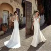 UPS 2022 Nieuwe Designer Beach Wedding Jurken Sexy Lace Applique Sheer Neck Floor Lengte Bohemian goedkope plus size bruidsjurken