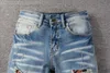 I jeans ricamo rosa di alta qualità moda blu blu strappato maschio marea slim pantaloni # 078