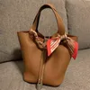 Woman Bags Hermee Bag Picoton Vegetable Basket Spring Head Leather Fashion Trend Lock Versatile Handbag Color Matching Bucket 4 NO8K