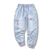 Jeans pour hommes Streetwear Hip Hop Cargo pantalon élastique Harun Joggers en automne et au printemps hommes tissu