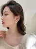 Stud Korea Design mode sieraden prachtige koper ingelegde zirkoon boog parel oorbellen elegante dames dagelijkse kleine oorbellen stud odet22 farl