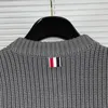 Giacche da uomo Marchio di moda coreana Maglione Coppia colletto alla coreana Cappotto di lana di lusso monopetto Tasche della giacca lavorata a maglia a righeUomo