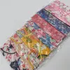 Japannisches Blumenmuster Einweg-Gesichtsmasken atmungsaktiv 3-lag-nicht gewebte Masken mit elastischen Earloop für Erwachsene Männer Frauen tägliche Party Individuelle Packung verwenden
