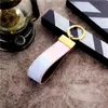 Top diseñador llavero llavero hebilla llaveros pulsera moda marca accesorios lujo cuero llavero colgante flor regalo hombres mujeres bolsa de coche amante llaveros