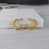 Boucles d'oreilles tendance en spirale pour femmes, bijoux géométriques à la mode, rétro en forme de C, clous d'oreilles rotatifs sur la ligne