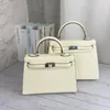 Handväska kopplingspåsar läder handväskor mode duffel väskor hanterar handväska kosmetisk plånbok