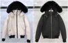 Down Jacket Men's Fur Collar Parka Invierno Implaz de pato blanco Capa Moda de moda Men y mujeres Versión casual para mantener caliente