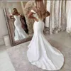 Robes de mariée blanches personnalisées trompette ivoire robes de mariée hors épaule sirène chérie sans manches satin bouton dos nu plus la taille