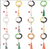 إكسسوارات التيتانيوم الرياضية 50pcs أساور الخشب العصرية أحادية التصميم غرام Disc -keychain wooden beaded softball print pracelet sport sport