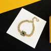 FF Jewelry Sets Designer Neckalce For Mens Ear Clip Bracelets Women Stud Earrings Luxury Gold Pendant Bangle Chain Link Enamel Suit