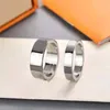 Projektanci pierścionek dla mężczyzn tytanowe stalowe pierścionki srebrne zaręczyny dla kobiet biżuteria luksusy miłość pierścionek list Heanpok 22053001R