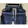 Kobiety dżinsowe w dużych rozmiarach Elastyczna talia wysoka talia cienkie proste niebieskie dżinsy luźne spodnie haremu jesienne samice czarne spodnie 5xl L220726