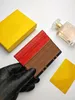 Marque de luxe F créateur de mode femmes nouveaux porte-cartes caviar femme mini portefeuille couleur pure cuir véritable texture caillou noir rouge jaune marron portefeuille avec boîte