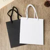 Sac cadeau en papier Kraft Simple de haute qualité, blanc et noir, boîte à bonbons avec poignée, emballage cadeau pour fête d'anniversaire et de mariage