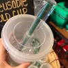Pronto para enviar Starbucks 24oz/710ml canecas plásticas Mermaid deusa reutilizável bebida clara bebida de pilar de fundo liso Copo de palha