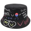 Boll kapar den senaste unisex Panama Fisherman's Hat Women's Sun Black and White Graffiti Men's Outdoor Hip Hop Harajuku Bucket