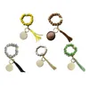 Bracelet à balle sportive Bracelet Keychains Tassel Keychains pendentif Creative Football Basketball Baseball Bracelets en bois en bois