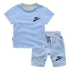 Summer Basketball Brand LOGO imposta T-shirt per bambini Pantaloncini a maniche corte 2 pezzi Abbigliamento sportivo per bambini Ragazzi Ragazze 100% cotone Casual