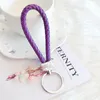 Keychains faits à la main 12 couleurs scintillantes cristal Pu en cuir en cuir en tricot en cuir en tricot pour couples pour femmes accessoires de sacs de voiture pour filles