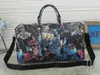 53cm 대용량 여성 여행 가방 여행 가방 유명한 클래식 새로운 남성 어깨 디자이너 Duffel 가방 수하물에 휴대