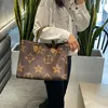 Grande capacité fourre-tout mode Femme en cuir Designers sacs à bandoulière femme sac à main poignée dame sac à provisions sac de créateur de luxe H0269