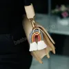 Vävd regnbåge nyckelringar Ringar för kvinnor Bohemian Handgjorda Hängsmycke Etnisk Tassel Key Holder Nyckelring Macrame Väska Charm Kedjor Bildekoration Hängande Smycken Gåvor