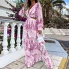 Kvinnor klär nya ruffle ihåliga mode damklänningar semester långärmad blommig tryck kvinnlig maxi kläder sexiga backels 2021 cx220510