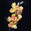 Nouvelle arrivée une fausse branche de fleur de Cymbidium 15 têtes Real Touch PU tige d'orchidée papillon Cymbidium pour la décoration florale de mariage