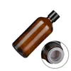 Imballaggio Vuoto Bottiglia marrone trasparente Spalla tonda Coperchio a vite nero con tappo interno Contenitore per imballaggio cosmetico ricaricabile portatile 5ML 10ML 15ML 20ML 30ML 50ML 100ML