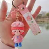 Porte-clés dessin animé fleur de cerisier fille poupée porte-clés fille coeur belle voiture sac pendentif créatif cadeau ornement personnalité