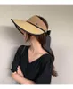 Chapeaux à bord large ruban ajusté en été paille supérieure vide pour les femmes pliables grande protection du chapeau de plage capuchon