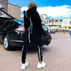 Tvådelade byxor för kvinnor Vinteroversize träningsoverall Ryggdragkedja Lång huvtröja Set Street Sportswear Pullover Hip-Hop Tvådelad Kvinnor Kvinnor