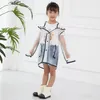 Neue EVA Nette Baby Kinder Transparent Regenmantel Kindergarten Grundschüler Quaste Große Kapuze Wasserdicht Atmungsaktiv Wandern Reisen Regen Poncho LT0047