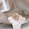 Rings de cluster elegante petróleo branco pingando camélia para mulher coreana jóias de jóias de flores doces da menina de acessórios Toby22