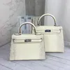 Handväska kopplingspåsar läder handväskor mode duffel väskor hanterar handväska kosmetisk plånbok