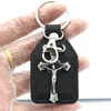 Keychains Jesus Cross Charms Cadena de teclas Ring PU Leather St. Benedict Pendiente Topeador de llaves Mujeres Accesorios de joyería Keychains