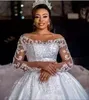 Pearls Beaded Ball Gown Luxury Wedding Dresses With Long Sleeves Lace Applique Beads Illusion Scoop Neck Button Chapel Bridal Dress Custom Made Bridal Robe De Mariee